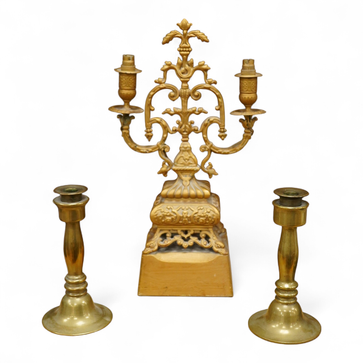 A pair of brass candlesticks and a gilt metal two branch gilt candelabrum, 45cm high
